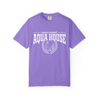 Zodiac Academy-themed comfort colors graphic tee by thtgrlreads in a vintage-washed lavender base featuring bold white "Aqua House" text and crest print, part of Back to School tees.