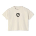 thtgrlreads Liv Zander collection vintage-washed cream crop top featuring a black intricate heart design with the letter "M," made from premium Comfort Colors fabric.