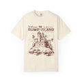 thtgrlreads vintage wash Comfort Colors graphic tee featuring a detailed castle illustration and "Welcome to Rumplisland" text in rustic font, inspired by romantasy themes.