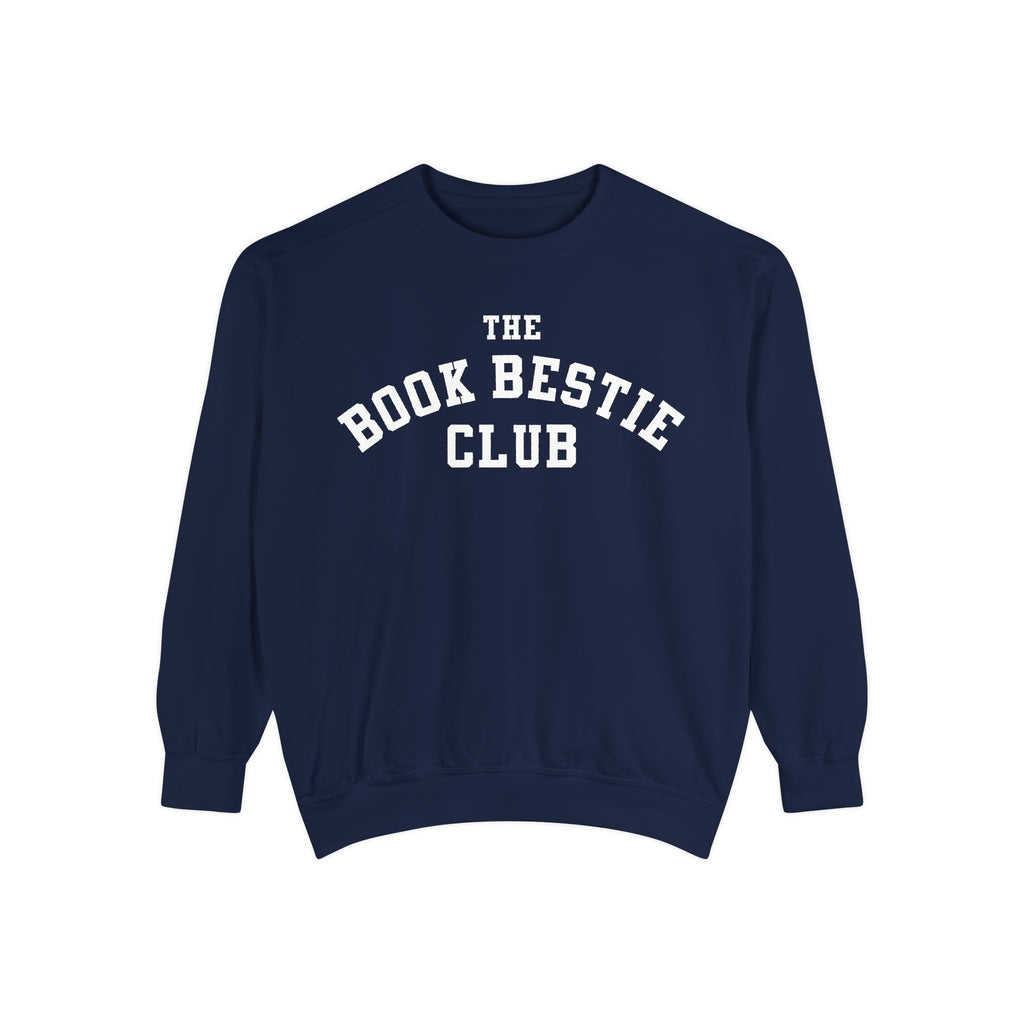 Navy oversized Comfort Colors crewneck sweatshirt from thtgrlreads Book Bestie collection featuring bold white collegiate-style text reading "The Book Bestie Club" across the chest.