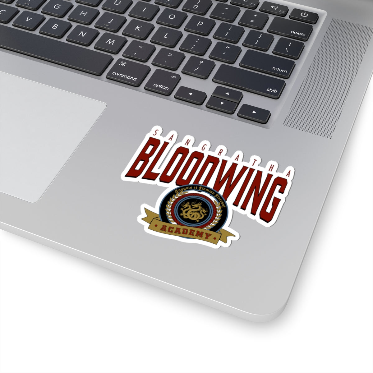 Sticker from the Bloodwing Academy collection by thtgrlreads featuring a bold red and white Bloodwing text with an ornate crest design, perfect for bookish fans.
