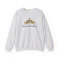 Thtgrlreads Wolves of Ruin officially licensed oversized crewneck sweatshirt featuring a vintage washed Comfort Colors fabric with an embroidered gold crown and gothic script text reading "Queen of Nocturna".