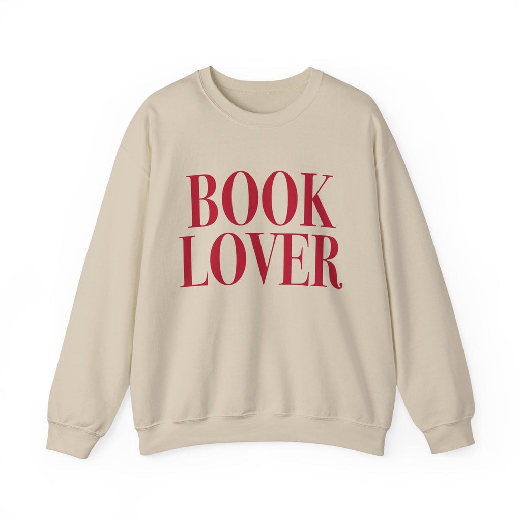 thtgrlreads cozy Comfort Colors crewneck from the Crewnecks collection featuring bold vintage puff print text "BOOK LOVER" in deep red on a soft beige, relaxed fit sweatshirt.