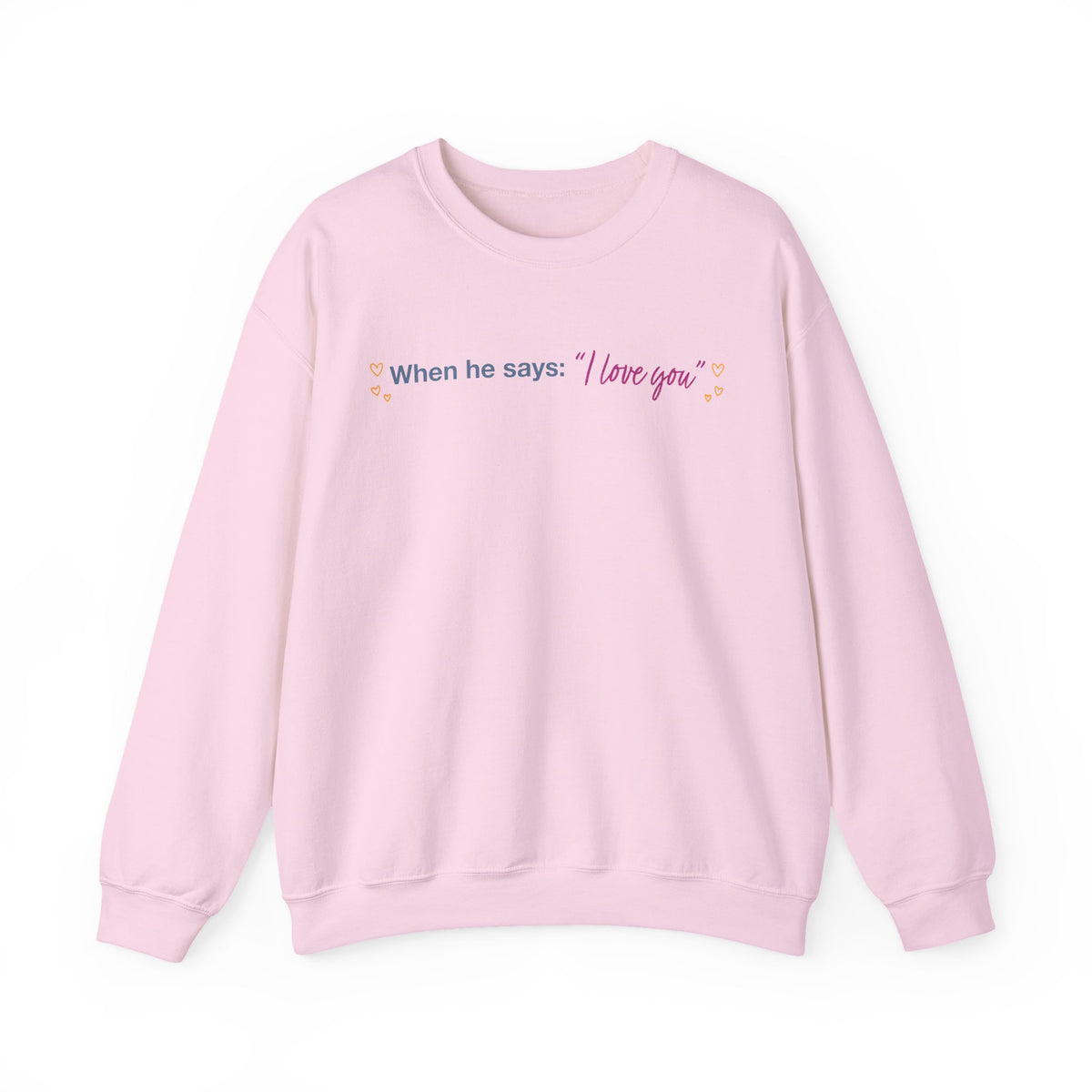 Pink crewneck sweatshirt featuring the quote When he says I love you with heart accents, Thtgrlreads Ali Hazelwood licensed bookish apparel.