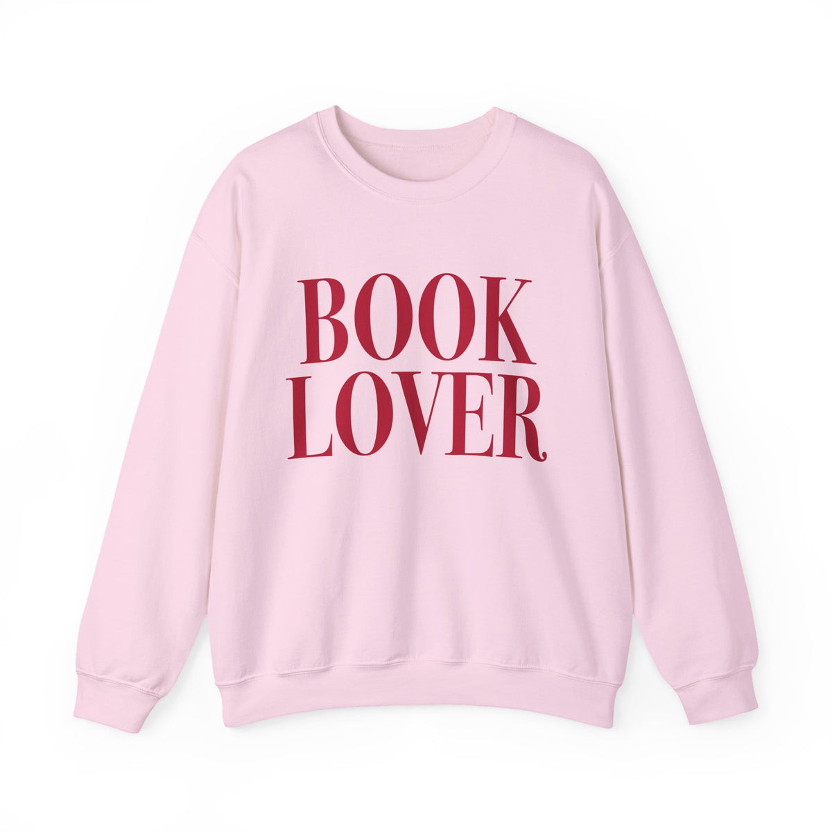 Thtgrlreads cozy Comfort Colors oversized crewneck from the Crewnecks collection features a vintage-washed soft pink fabric with bold red "BOOK LOVER" text, perfect for bookish apparel fans.