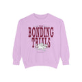 Thtgrlreads Wolves of Ruin collection oversized crewneck sweatshirt in lavender Comfort Colors fabric featuring vintage-style maroon text and an illustrated wolf pack graphic.