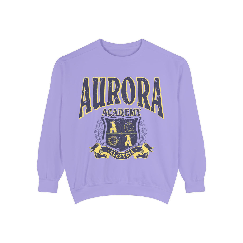 thtgrlreads Aurora Academy vintage wash oversized crewneck sweatshirt in lavender with distressed collegiate-style script and a crest featuring celestial symbols and a banner reading Alestria