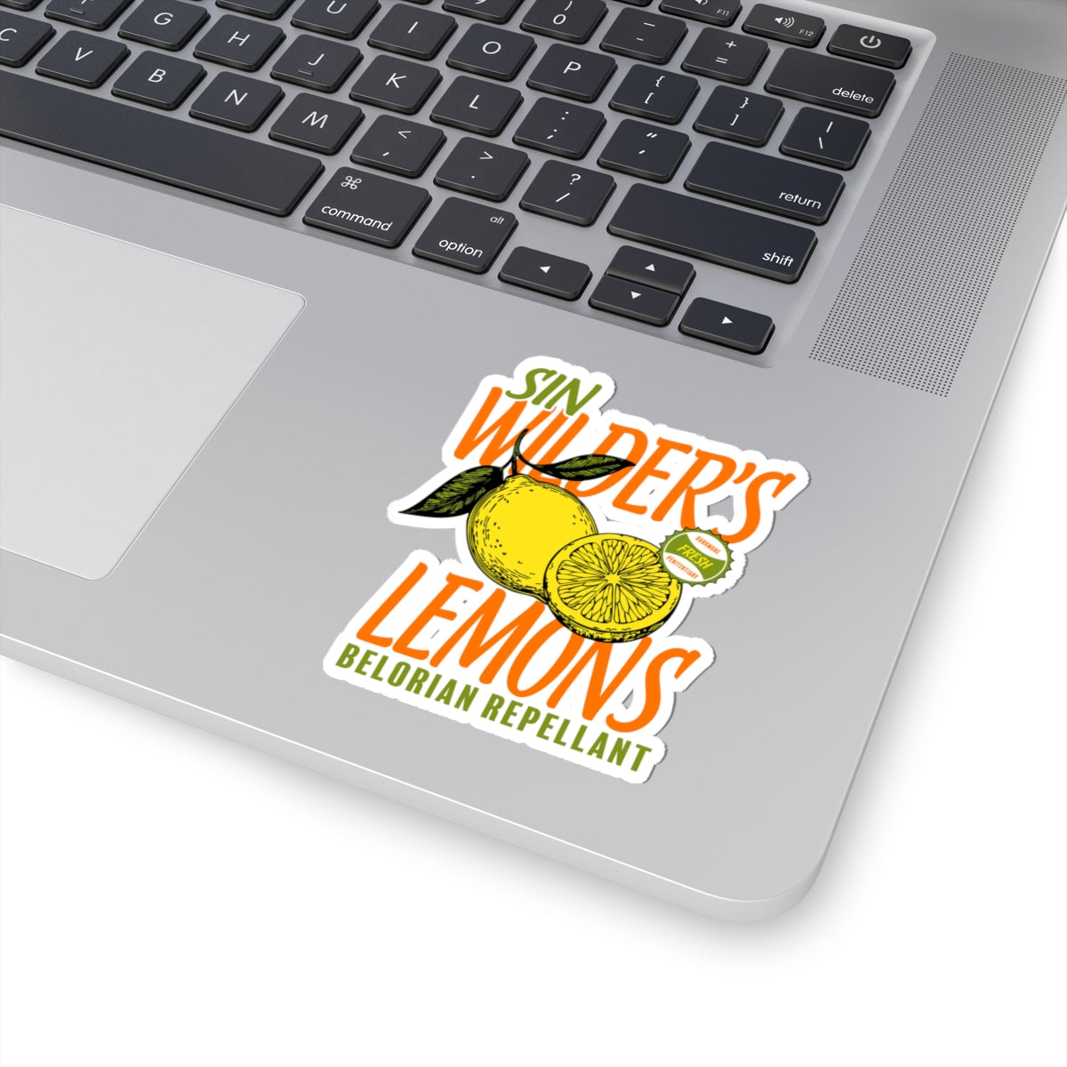 Sticker from thtgrlreads featuring a vibrant lemon graphic with text "Sin Wilder’s Lemons Belorian Repellant," part of the Darkmore Penitentiary collection.