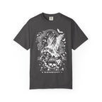 A dark gray comfort colors graphic tee from thtgrlreads featuring a Liv Zander inspired vintage-style design with a large detailed white owl, skull, and floral elements in the Tees collection.