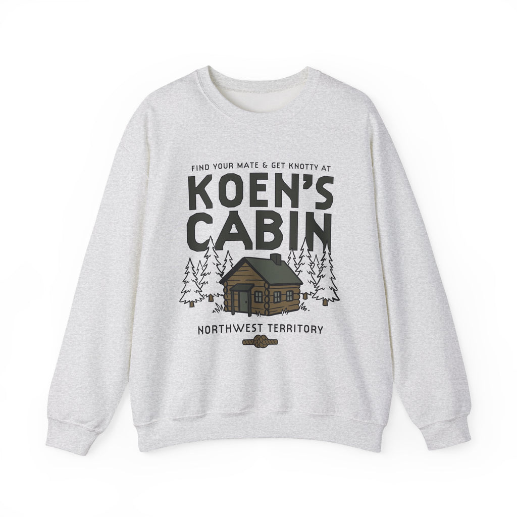 Light gray Koen's Cabin crewneck sweatshirt featuring a mountain cabin and pine trees from Thtgrlreads Ali Hazelwood collection