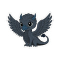 Cute cartoon-style dark blue baby dragon with large eyes and spread wings, part of thtgrlreads The Eating Woods sticker collection celebrating fantasy and romantasy themes.