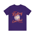 Thtgrlreads Ruthless Boys of the Zodiac collection features a purple Comfort Colors fitted tee with a vintage-style graphic reading "Middle Kipling Cake Club" and a heart-shaped cake illustration.