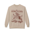 thtgrlreads Bloodwing Academy merch featuring a vintage wash Comfort Colors oversized crewneck sweatshirt with a sepia-toned castle graphic and stylized text reading "Welcome to Rump Island" in a cozy fantasy romance design.