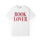 thtgrlreads officially licensed bookish apparel featuring a white Comfort Colors graphic tee with bold vintage-style red "BOOK LOVER" text, from the Tees collection.