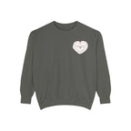 thtgrlreads officially licensed The Poison Daughter collection crewneck sweatshirt in vintage-washed Comfort Colors fabric, featuring a delicate heart graphic with scripted text on the chest.