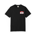 A black Comfort Colors graphic tee from thtgrlreads featuring a Kindred's Curse Saga-inspired red and white "Hello My Name Is Taran" name tag graphic on the chest.