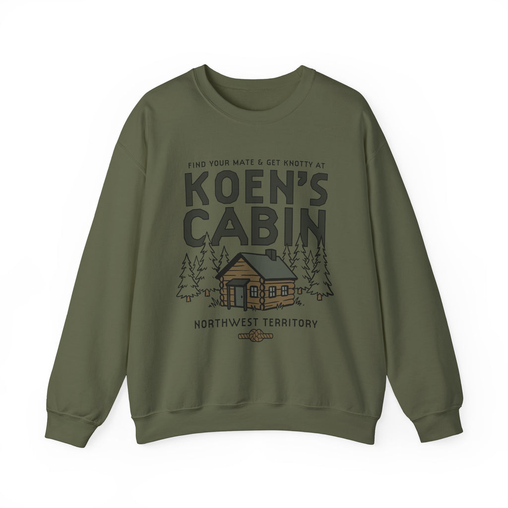 Olive green crewneck sweatshirt with Koen's Cabin wilderness graphic and Northwest Territory text, inspired by Ali Hazelwood's MATE, from Thtgrlreads Crewnecks.
