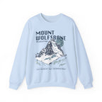 thtgrlreads Wolves of Ruin collection oversized crewneck sweatshirt in light blue with vintage-style mountain graphic and bold text, featuring premium Comfort Colors fabric.