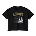 Black vintage-wash Comfort Colors crop top from thtgrlreads featuring Bloodwing Academy gothic script print and detailed castle graphic, part of official Bloodwing Academy tees.