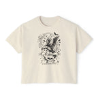 thtgrlreads Liv Zander collection cream comfort colors crop top featuring a dark romantasy design of a flying angler fish surrounded by skulls and bats, printed by Printify.
