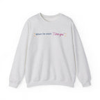 Light gray crewneck sweatshirt featuring When he says I love you in colorful lettering with heart accents, from Thtgrlreads Ali Hazelwood licensed bookish apparel