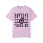 A vintage wash Comfort Colors graphic tee in soft lavender from thtgrlreads featuring a bold "Rawbond Training" design with a stylized howling wolf, part of the Wolves of Ruin collection.