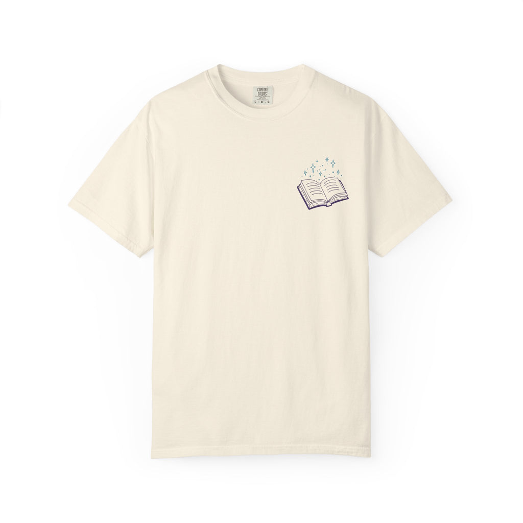 Thtgrlreads Book Bestie collection unisex Comfort Colors graphic tee in vintage cream with a small purple open book and sparkling stars print on the chest.