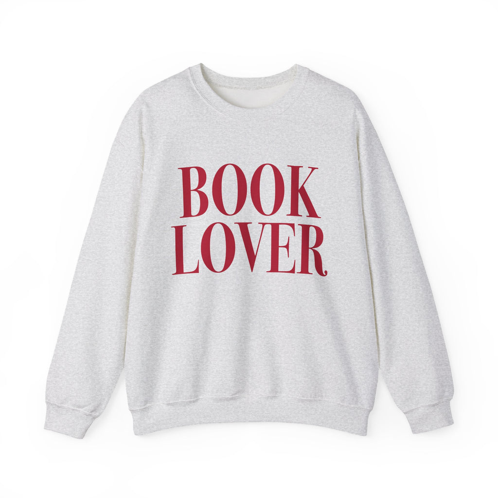Thtgrlreads crewneck from the Crewnecks collection features a vintage-washed Comfort Colors fabric with bold red "BOOK LOVER" text printed on a cozy, unisex sweatshirt.