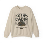 Cream Koens Cabin crewneck sweatshirt with a cabin and pine tree graphic, inspired by Ali Hazelwood, from Thtgrlreads licensed bookish apparel collection