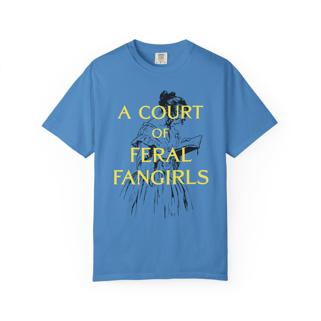 Comfort Colors graphic tee in vintage blue from thtgrlreads featuring a black sketch of a woman reading and bold yellow text "A COURT OF FERAL FANGIRLS" from the Off Brand, Tees, and Book Bestie collections.
