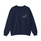 thtgrlreads Blood Bound collection oversized crewneck sweatshirt in navy blue by Printify featuring a small golden dragon graphic and Isla Draka text on chest in vintage wash Comfort Colors fabric