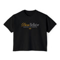 Kindred's Curse Saga crop top by thtgrlreads featuring a vintage black Comfort Colors fabric with elegant gold and white script text and a small crown graphic on the front.