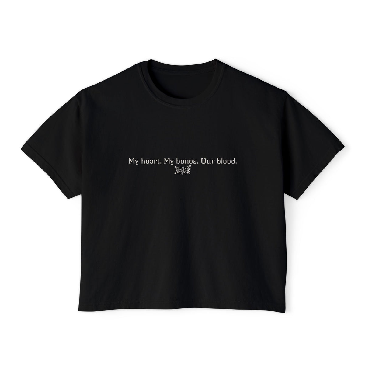 A black vintage-wash Comfort Colors cropped t-shirt from thtgrlreads featuring minimalist white text reading "My heart. My bones. Our blood." with a small decorative symbol, part of The Poison Daughter collection.
