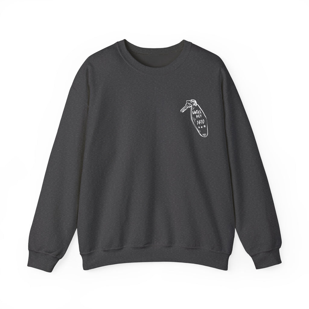 Thtgrlreads oversized crewneck sweatshirt from the Hockey Romance collection featuring a minimalist vintage white graphic on dark Comfort Colors fabric, combining cozy style with bookish flair.