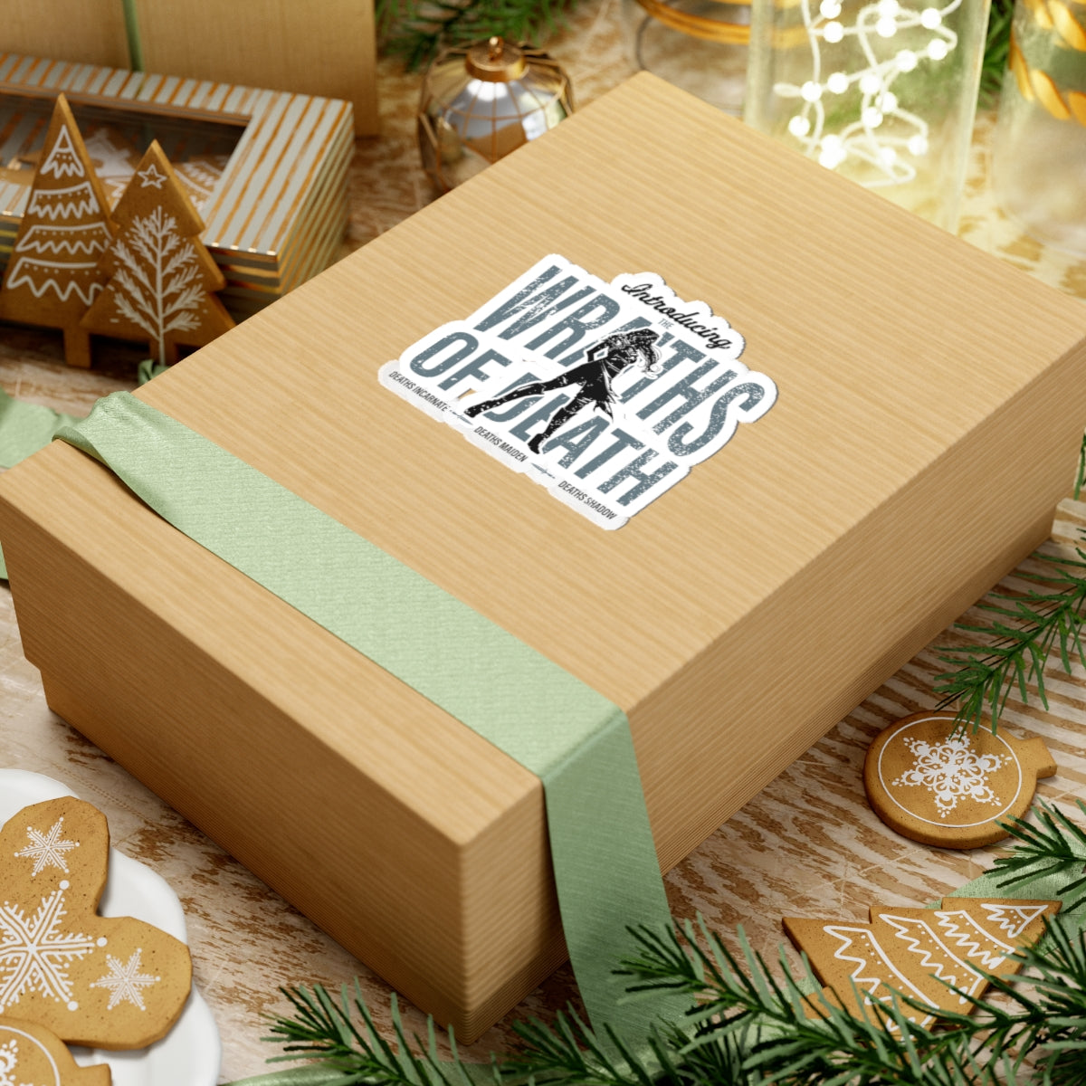 A thtgrlreads Wraiths of Death sticker from the Lady of Darkness & Legacy Series collection, featuring bold gothic text and dark fantasy design on a cozy holiday gift box.