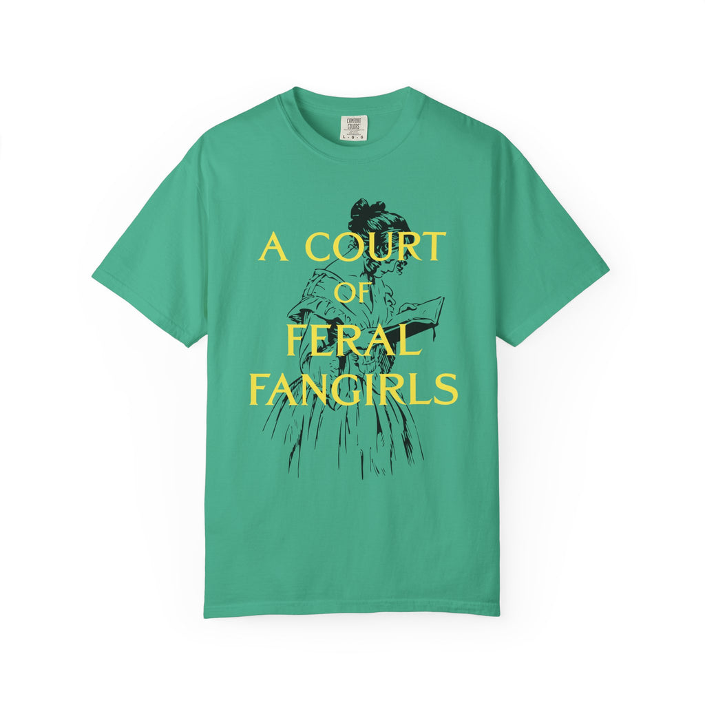 Thtgrlreads Comfort Colors graphic tee from the Off Brand and Book Bestie collections featuring vintage wash and bold yellow text "A Court of Feral Fangirls" with an illustrated figure reading.