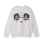 A thtgrlreads light gray Comfort Colors oversized crewneck sweatshirt from the Hockey Romance collection featuring a vintage graphic of crossed hockey sticks, a puck, and jerseys labeled "Jane 24" and "Lily 81" with a red heart above.