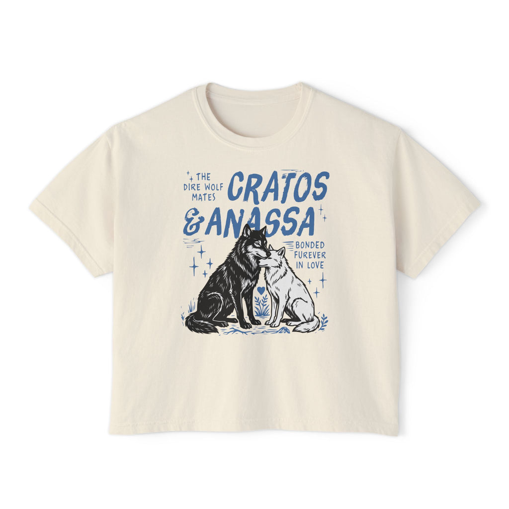 Thtgrlreads Wolves of Ruin collection cream comfort colors crop top featuring a vintage-style blue graphic of two wolves with "Cratos & Anassa" text, available via Printify.
