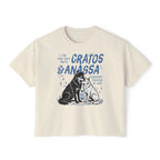 Thtgrlreads Wolves of Ruin collection cream comfort colors crop top featuring a vintage-style blue graphic of two wolves with "Cratos & Anassa" text, available via Printify.
