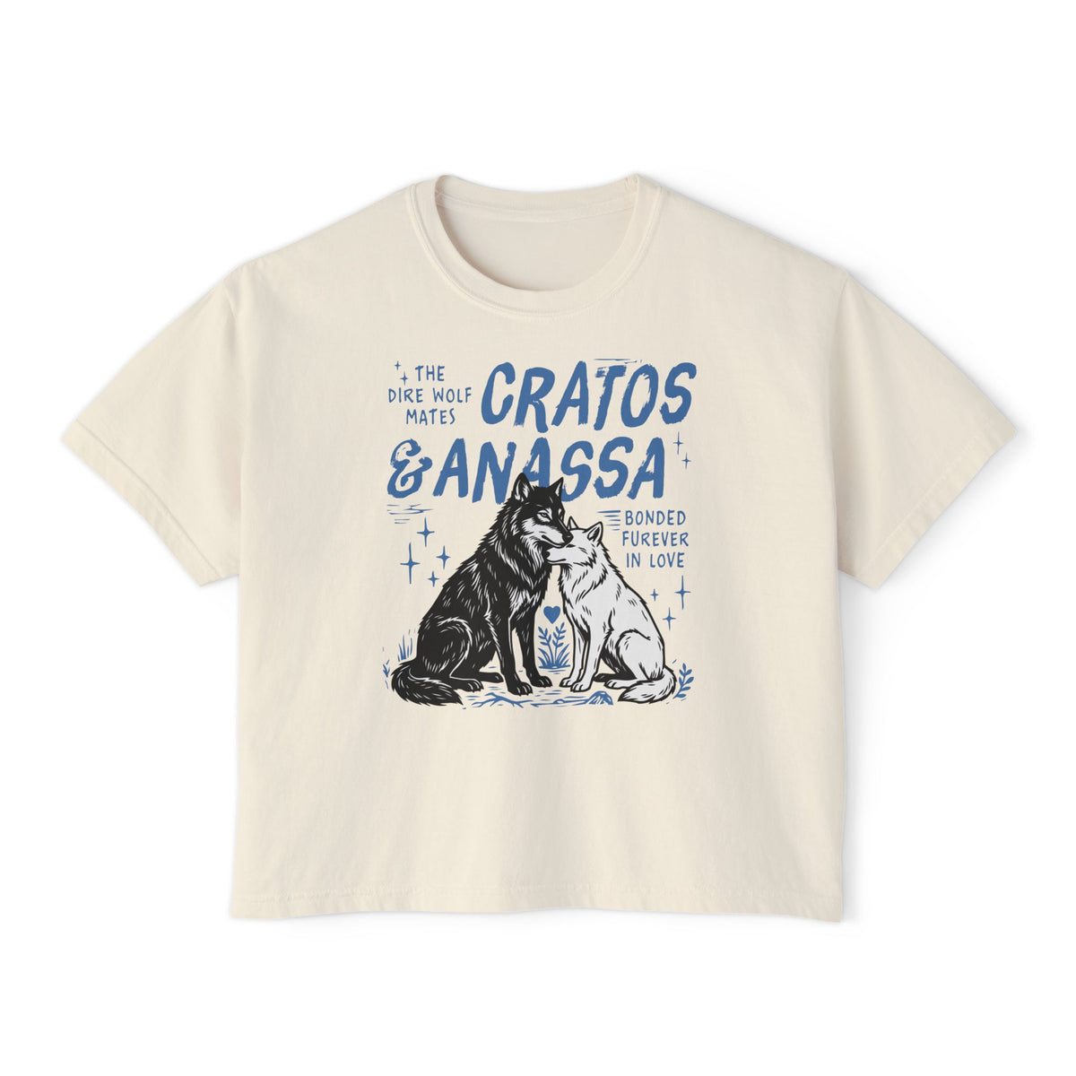 Thtgrlreads Wolves of Ruin collection cream comfort colors crop top featuring a vintage-style blue graphic of two wolves with "Cratos & Anassa" text, available via Printify.