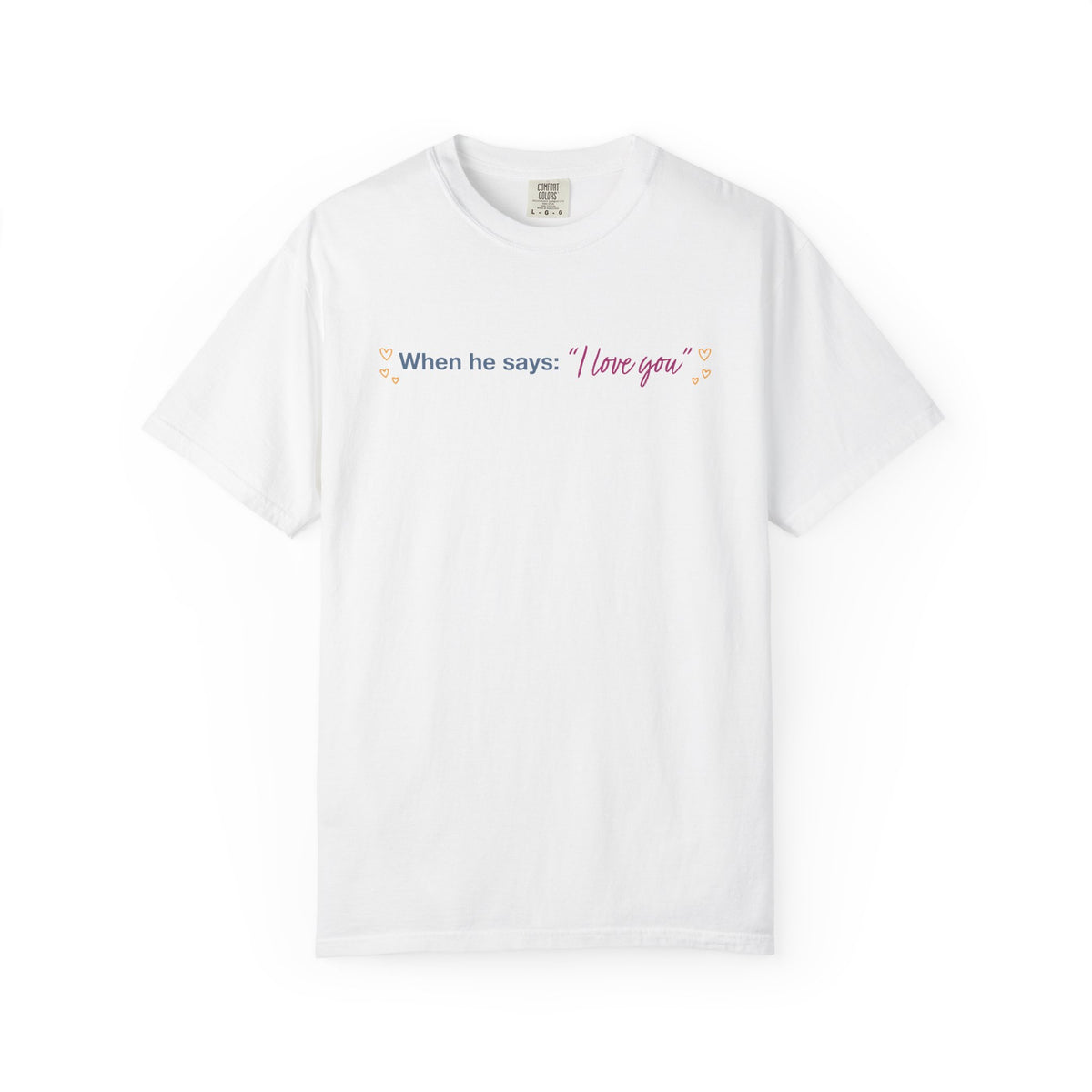 White Comfort Colors graphic tee featuring When he says I love you with delicate decorative accents, officially licensed Ali Hazelwood Love Theoretically merch by Thtgrlreads