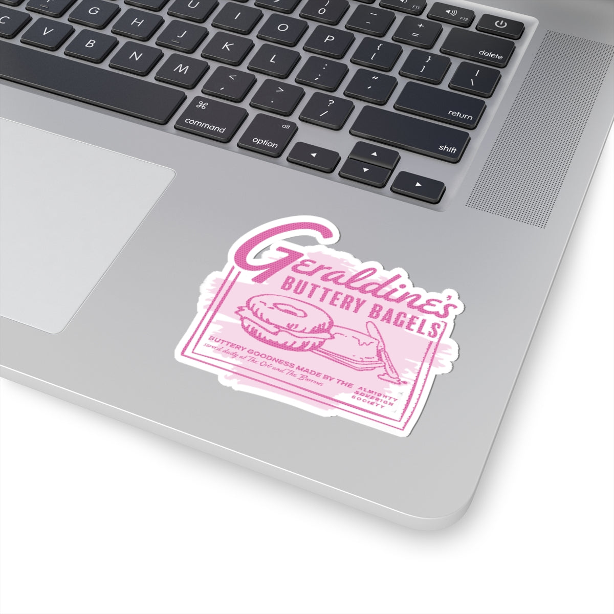 Zodiac Academy-themed "Geraldine’s Bagels" sticker by thtgrlreads featuring a pink vintage-style graphic of a bagel and knife, part of the Stickers collection.