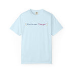 Light blue Comfort Colors tee featuring the phrase When he says I love you with floral accents, an officially licensed Ali Hazelwood design from Thtgrlreads