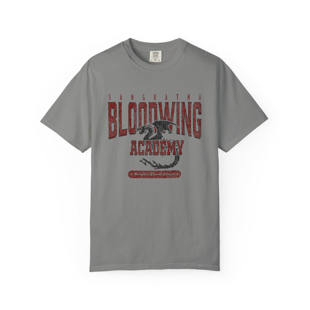 Bloodwing Academy comfort colors graphic tee by thtgrlreads features a vintage washed gray fabric with a distressed red and black dragon print, perfect for fandom fans of the Bloodwing Academy collection.
