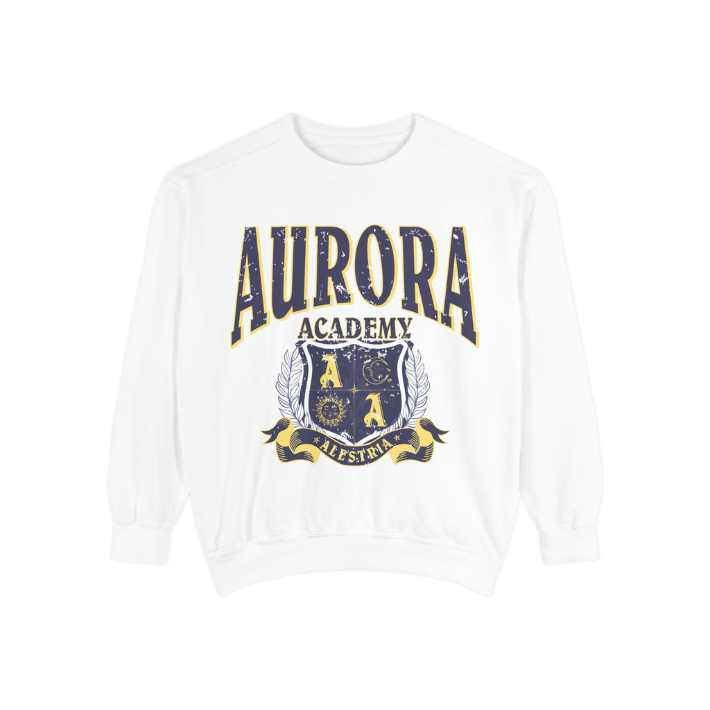 A white oversized crewneck sweatshirt from thtgrlreads featuring vintage puff print text and crest graphic from the Aurora Academy collection, part of Ruthless Boys of the Zodiac and Back to School crewnecks.