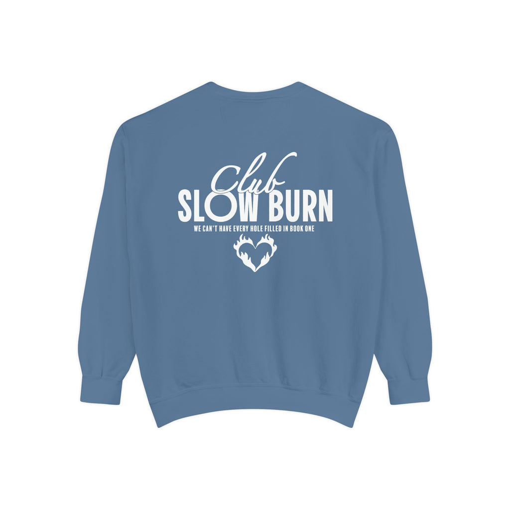 thtgrlreads Crewnecks and Book Bestie collection oversized crewneck sweatshirt in vintage-washed blue Comfort Colors featuring bold white printed "Club Slowburn" text and a small flame heart graphic.