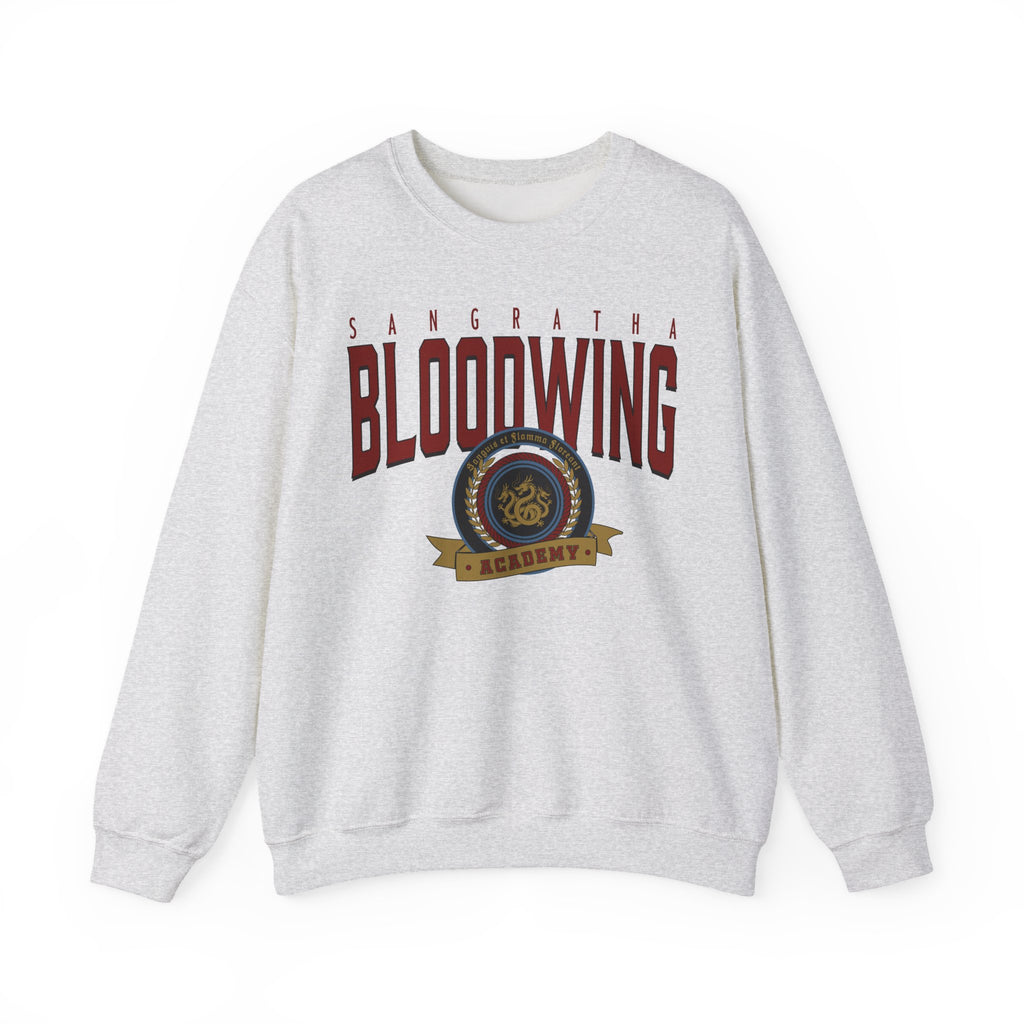 Bloodwing Academy-themed oversized crewneck sweatshirt by thtgrlreads featuring a vintage wash and bold graphic crest print, part of Bloodwing Academy and Crewnecks collections.
