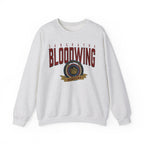 Bloodwing Academy-themed oversized crewneck sweatshirt by thtgrlreads featuring a vintage wash and bold graphic crest print, part of Bloodwing Academy and Crewnecks collections.