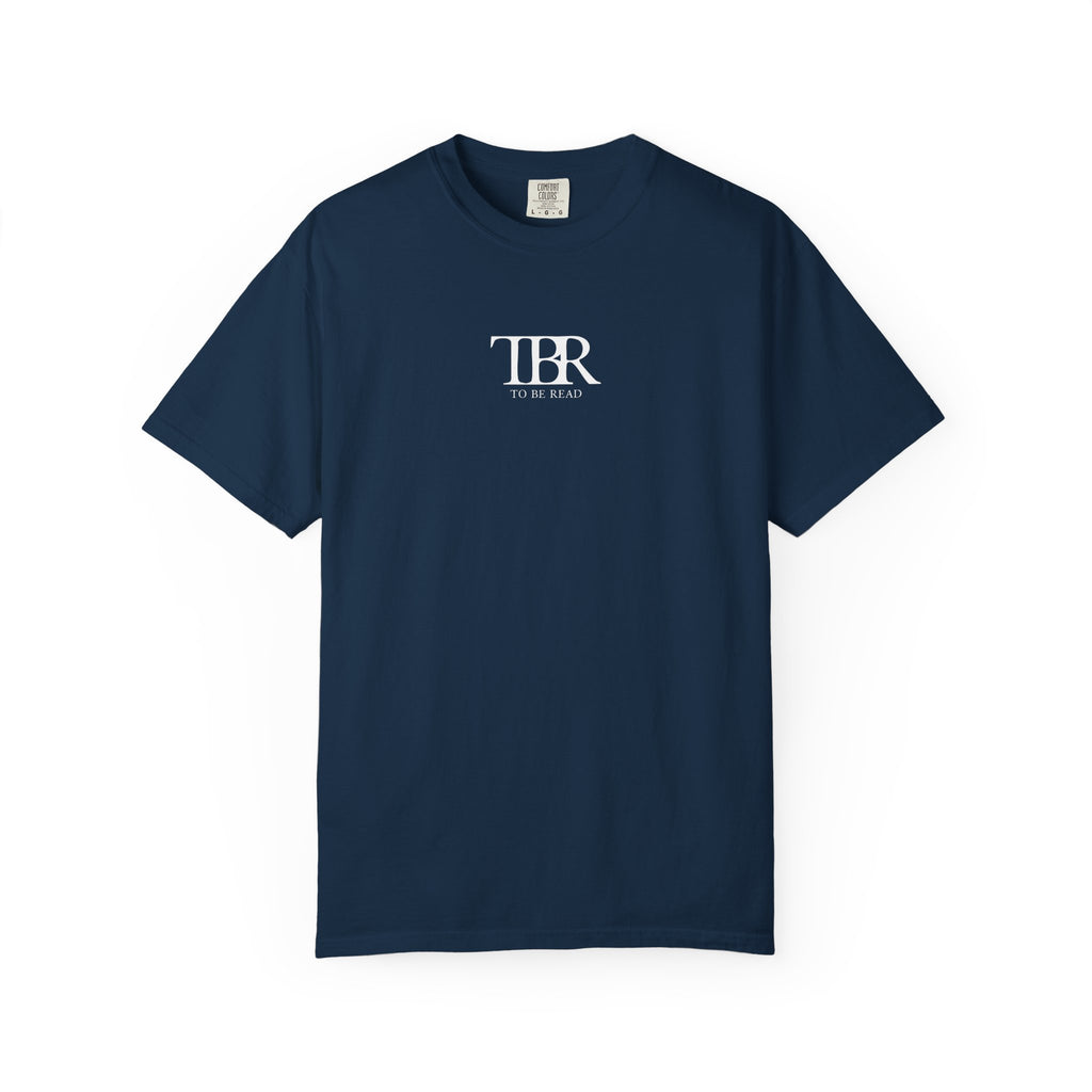 A navy Comfort Colors graphic tee from thtgrlreads featuring a simple white vintage print reading "TBR To Be Read," part of The Life of a Book Bestie and Off Brand collections.