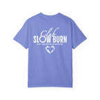 thtgrlreads officially licensed Comfort Colors graphic tee from the Book Bestie collection featuring a vintage-wash lavender fabric with white "Club Slow Burn" text and flame heart design.